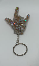 Load image into Gallery viewer, Ily silver hologram glitter and chunky glitter with some orange color