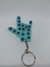 Load image into Gallery viewer, ily transparent blue with black paw prints glitter