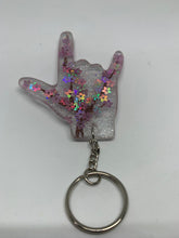 Load image into Gallery viewer, ily transparent with glitter and holographic pink flowers and brown branch 
